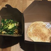 Green scramble with Yukon Gold potatoes and a side pancake with agave syrup at Rabbits Cafe in Portland