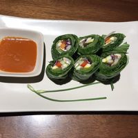 Mustard green roll with gấc sauce  at Hum Vegetarian - District 1 in Ho Chi Minh City