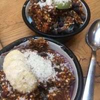 Lots of granola but tiny half filled bowls  at Wild & The Moon - rue Charlot in Paris