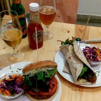 Vegan red rice and tempeh burger with sojanese & vegan hummus wrap with grilled veggies at Almalibre Acai Bar in Valencia