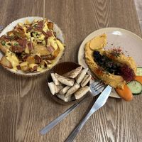 Patatas and hummus   at Almalibre Acai Bar in Valencia