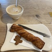Café latte & tortillon (the gingerbread cookie is not vegan ☹️)  at Le Pain Quotidien - Tongres in Brussels
