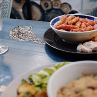 Two dishes at the beautiful outdoor seating table.  at Na Stopnickah in Koper