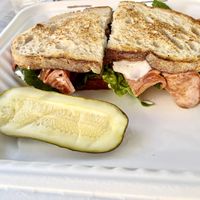 Vegan BLT sandwich and pickle.￼ at The Butcher's Son in Berkeley