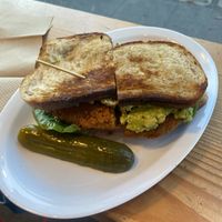 Killer BLAT: sourdough w/ fried chicken, mayo, lettuce, tomato, bacon, jalapeños (removed) & smashed avocado 😋 Would totally order again, minus I don’t do spicyy  at The Butcher's Son in Berkeley