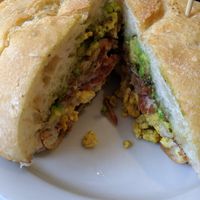 This is My Addiction: Toasted Garlic Buttered Ciabatta with Bacon, Scrambled Egg, Grilled Mozzarella and Avocado at The Butcher's Son in Berkeley