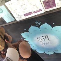Checking out the menu outside, COVID-19-style... at OM Foods in Chico
