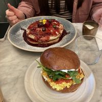 Berry Pancakes (top) 🤤.  Tofu scramble Sandwich (bottom) 🤤  at Mildreds - Kings Cross in North London
