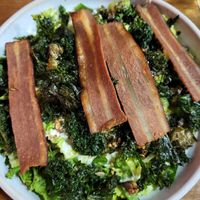 The kale artichoke caesar salad with added "rashers" at Mildreds - Kings Cross in North London