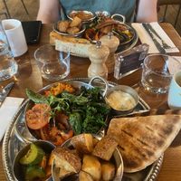 Meze brunch! Sooooo good. The tofu and greens were so flavoursome and the pitta and hummus was lovely   at Mildreds - Kings Cross in North London