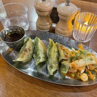 Kimchi gyoza - comes with a small side of kimchi and a sesame dipping sauce  at Mildreds - Kings Cross in North London