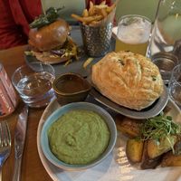 Mushroom pie with mushy peas, burger and fries.  at Mildreds - Kings Cross in North London
