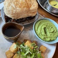 Mushroom pie with smashed peas and fried potatoes  at Mildreds - Kings Cross in North London