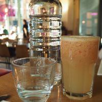 Tap Water and Ginger Pink Juice of grapefruit, pear, apple and ginger at Mildreds - Kings Cross in North London