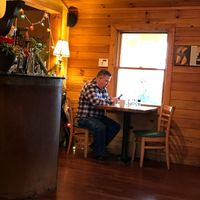 Atmosphere inside is cozy and inviting.   at La Guinguette in Black Mountain