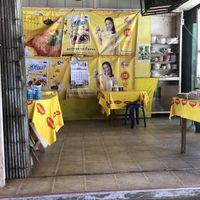Quirky little shop decked out in Maggi table cloths   at Hongming Vegetarian Food in Krabi