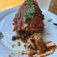 Soy “beef”, rice, pepper, black beans and corn on the inside and tomato sauce, vegan cheese and cilantro on the outside   at Poyo & the Sprout in St Johns