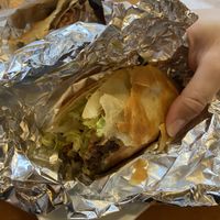 Half eaten tacos before I took a photo. So good.  at Poyo & the Sprout in St Johns