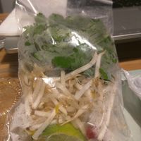 Fresh Herbs, Beansprouts, Chilli and Lime in separate packaging for Takeaway at Pho in Cambridge