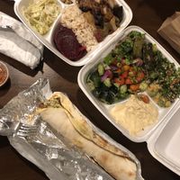 Falafel wrap and Vegetarian platter. All vegan! at Peace Bakery & Deli in Austin