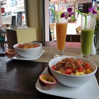 Bircher muesli topped fruit and granola, with shakes at Prava Bar in Koh Samui