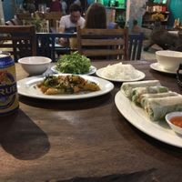 traditional spring rolls and vegetarian fish with turmeric dill herbs and noodles  at Am Vegetarian & Hideaway in Hoi An