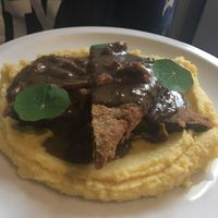 Seitan patty, mushroom gravy, whipped mashed potatoes at Seitan Urban Bistro in Lima