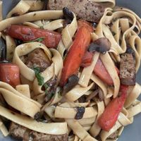 Fettuccine with seitan, mushrooms, tomatoes, and soy sauce   at Seitan Urban Bistro in Lima