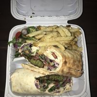 falafel wrap with sides of fries and salad  at Dish N' Dash in Fremont