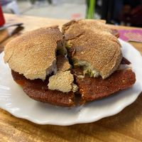 Choripán with chimichurri at La Alpargata in Madrid