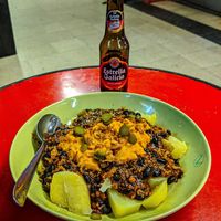 Patatas con chili. at La Alpargata in Madrid