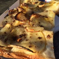 pizza with potatoe and truffle  at MADENITALY in Copenhagen