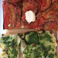 Pizza slices at MADENITALY in Copenhagen