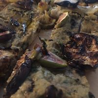 Pizza with aubergine and figs and pizza with potatoes, seitan and aged cashew cheese at MADENITALY in Copenhagen