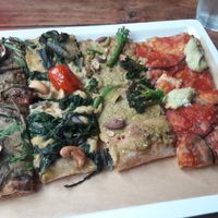 4 half-slice pizza at MADENITALY in Copenhagen