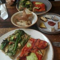 Pizza and cheese board at MADENITALY in Copenhagen