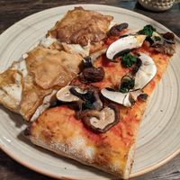 Mixed mushrooms (right) and cauliflower cream pizza (left) at MADENITALY in Copenhagen
