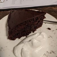 Chocolate cake with cream at MADENITALY in Copenhagen