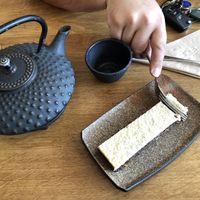 White low caffeine tea and brownie. at Excalibur Cafe in Glastonbury