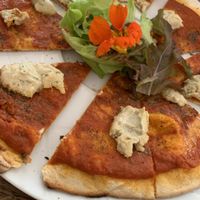 Cashew cheese pizza  at Excalibur Cafe in Glastonbury