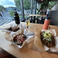 Option to eat inside Funky Fauna, but outdoor picnic tables available (rain and lightning chased us inside)  at A Broken Angel - Food Cart + Catering in Bend