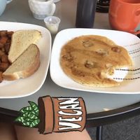 Spinach and tofu scramble with home fries and a banana pancake at The Purple Rooster Cafe in Attleboro