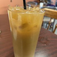 Iced pumpkin coffee with oat milk  at The Purple Rooster Cafe in Attleboro