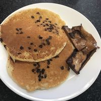 Chocolate chip pancakes and tofu bacon! Even came with a side of vegan butter at The Purple Rooster Cafe in Attleboro
