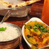 Veggie curry, with white rice and a tequila su rose. The naan behind was for the non vegan at the table. I don't know if there was vegan naans I didn't ask because often there are  at Yeti Restaurant in Davis