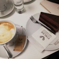 Almond milk caffelatte and cake at Vis a Vis Vincek Cake and Ice Cream in Zagreb