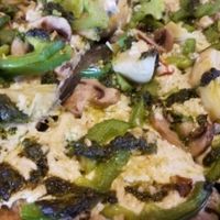 vegan pizza -Olive oil base, Daiya cheese, artichokes, green peppers, onions, pesto, basil, mushrooms, gf crust  at Mellow Mushroom in Huntsville