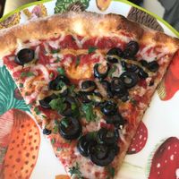 Light vegan cheese, fresh garlic and black olives  at Amici's East Coast Pizzeria in San Mateo