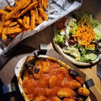 Eggplant with sweet potato fries and salad at Rumpelstilzchen in Darmstadt