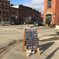 Sidewalk sign at Suecakes in Belfast